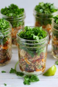 Burrito Bowl Mason Jar Salads comes with sweet potatoes, quinoa and chicken
