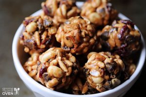 Trail Mix Energy Bites contain dried fruit, chia seeds, and natural peanut butter
